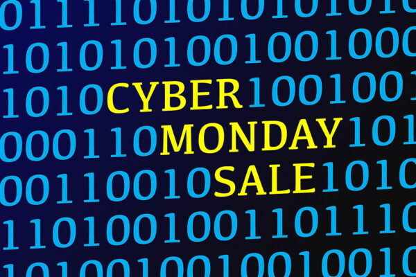 Cyber monday sale text between blue binary data on screen